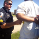 Sgt. James Young tasing Marco Stephenson in the side (KDFW-TV screenshot)